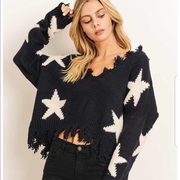ripped star sweater